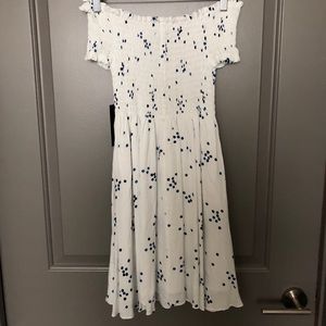 white polka dot strapless mini dress